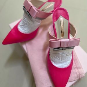 Sophia Webster Andie Bow 85 mules in pink/silver.